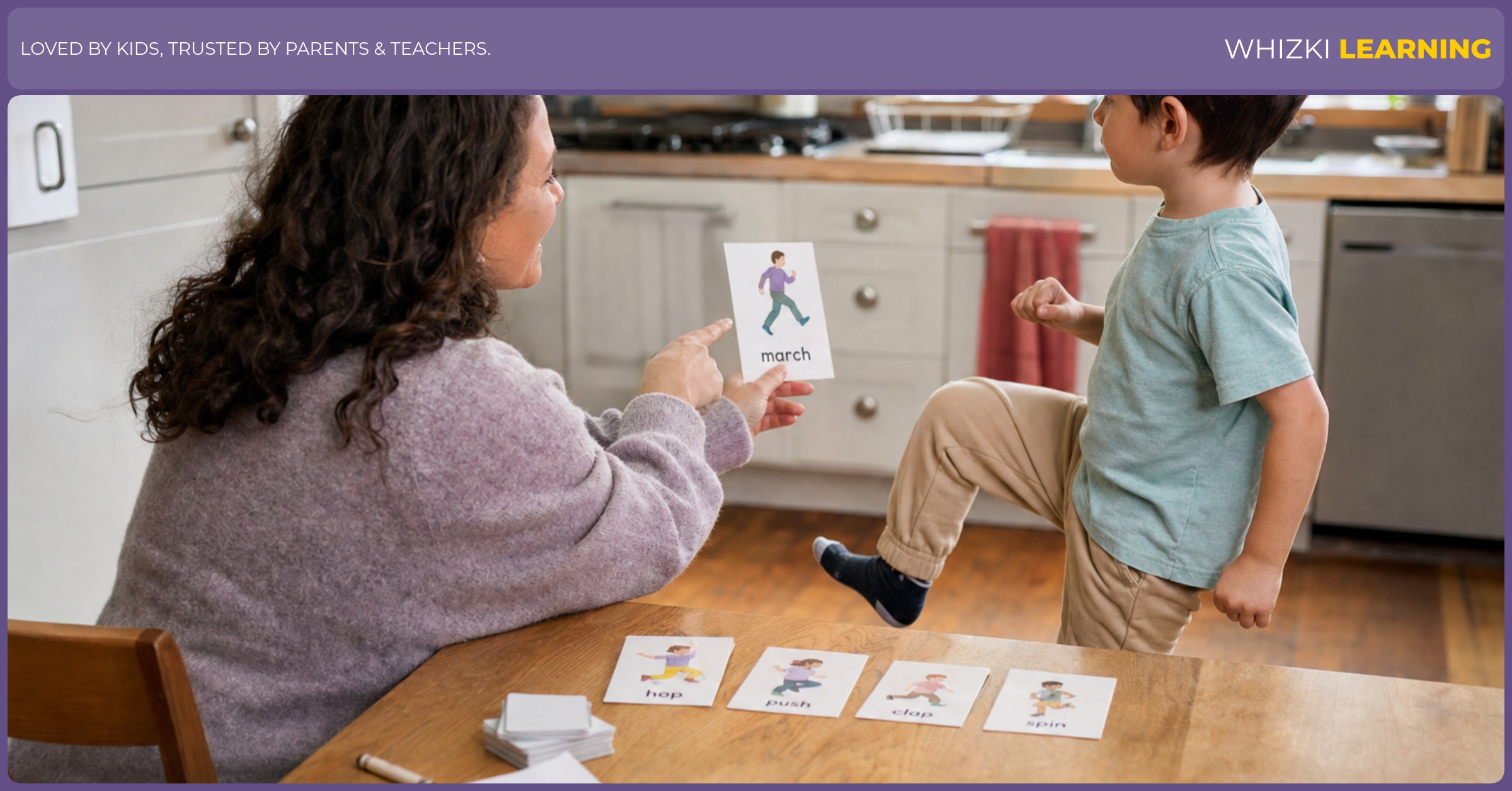 A parent and child practice M action word cards together at a warm kitchen table.