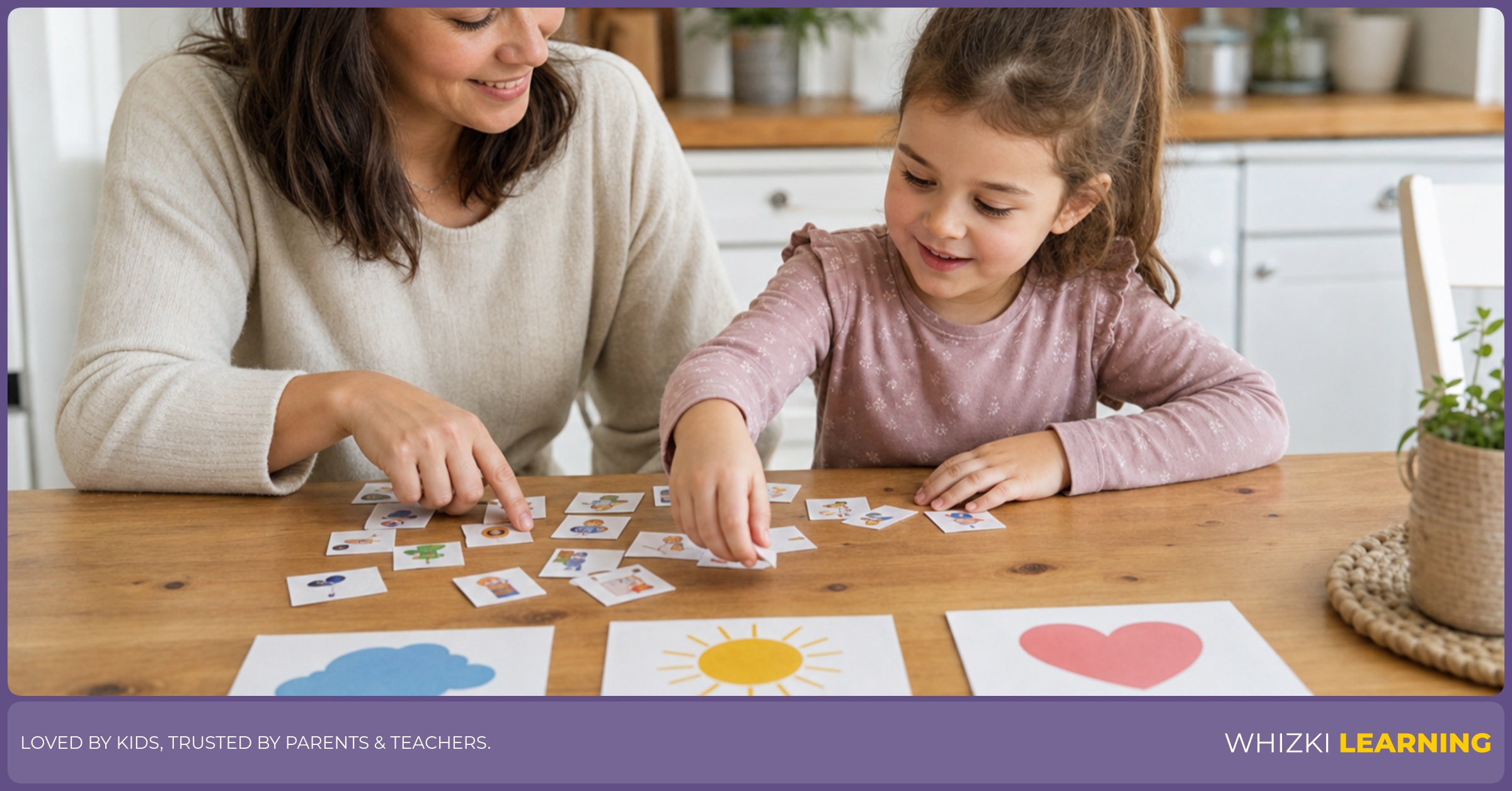 A parent and preschool child sit at a kitchen table sorting paper adjective cards that start with I into three piles, with calm faces and fingers pointing to each card.