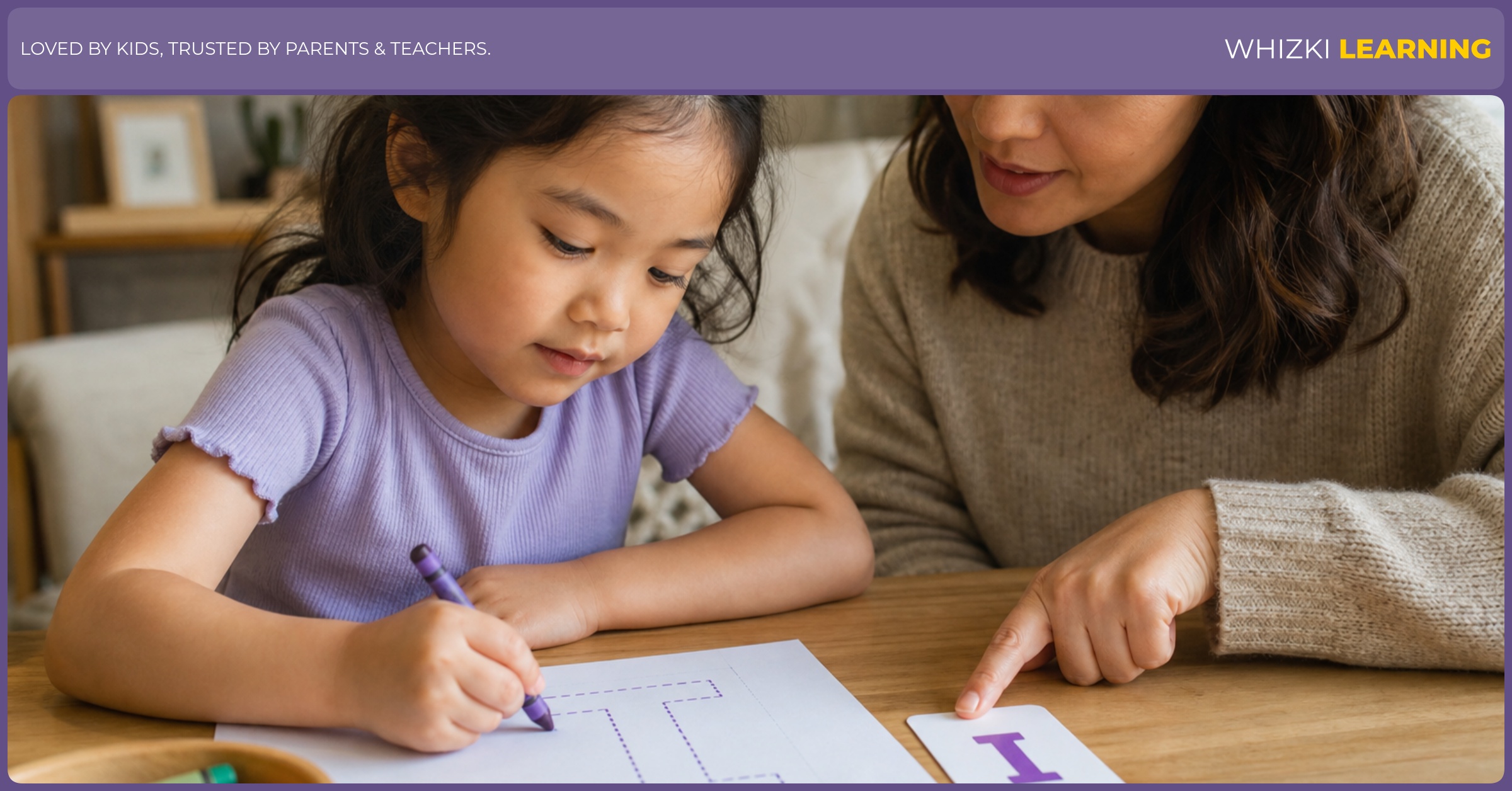 A parent and child practice tracing the capital letter I while saying an adjective starting with I, with crayons and a simple card on the table in warm natural light.