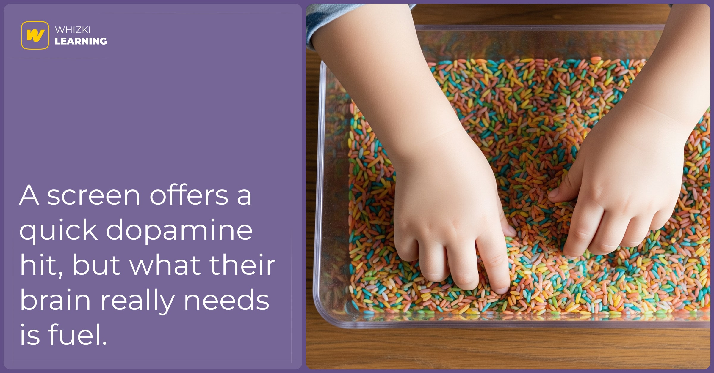 A top-down view of a child's hands scooping and pouring colorful rice in a clear sensory bin on a wooden table.