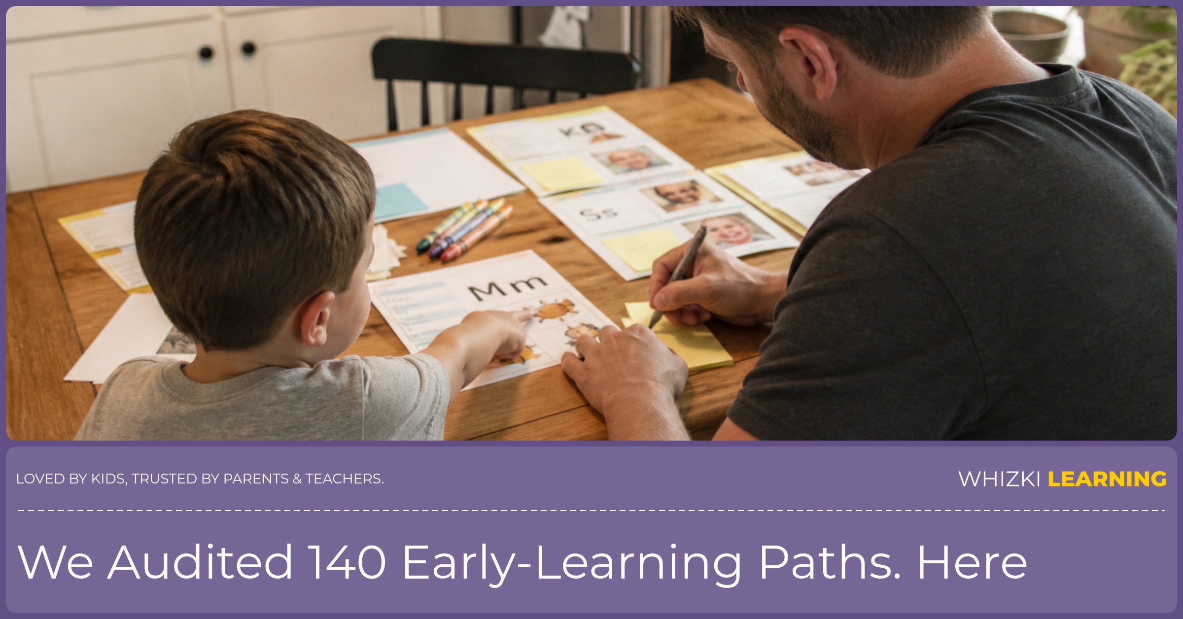A parent and child sort printed learning pages with sticky notes at a kitchen table.