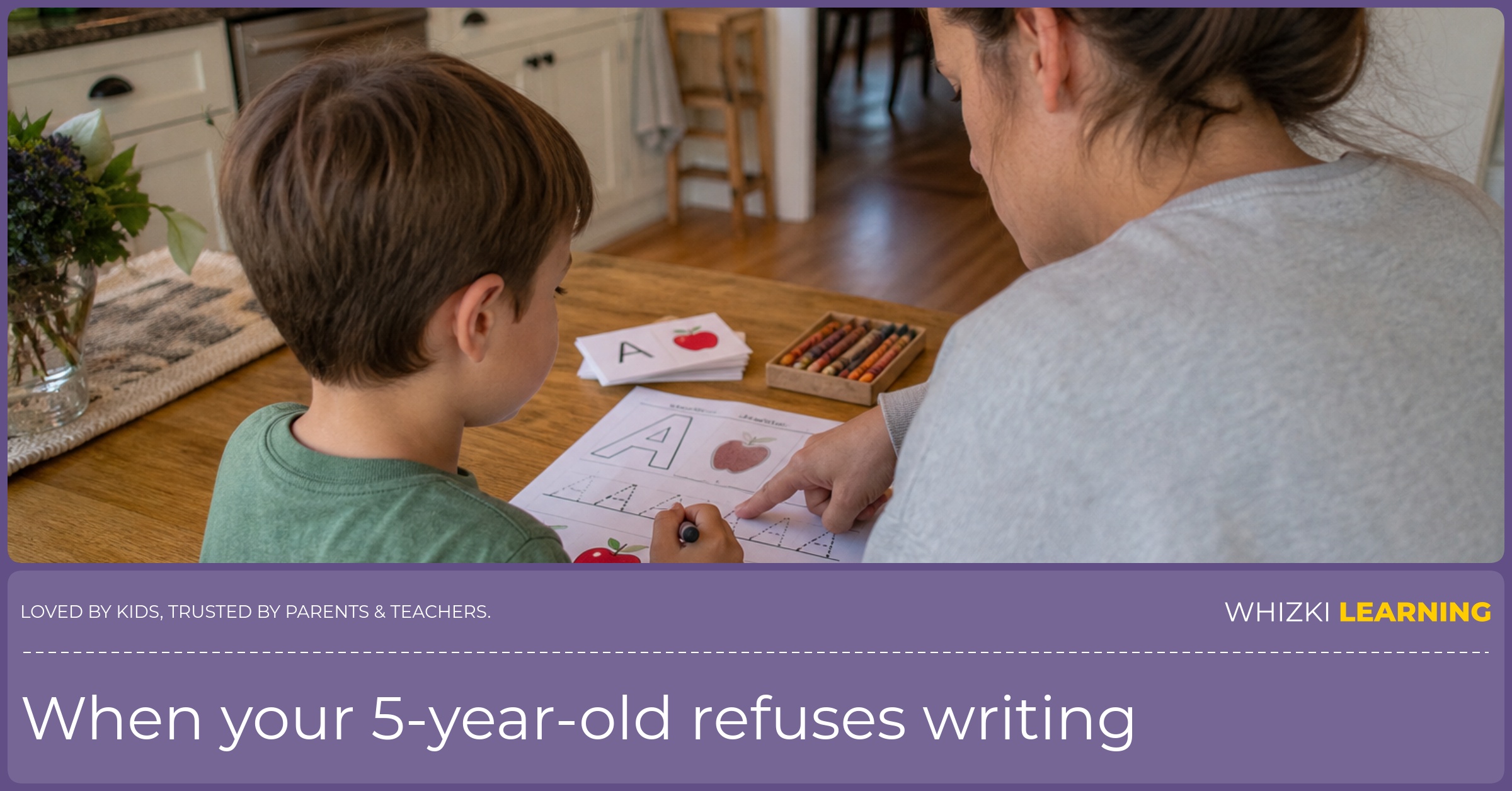 A caregiver points to one small writing task while a child holds a crayon and looks at the page calmly.