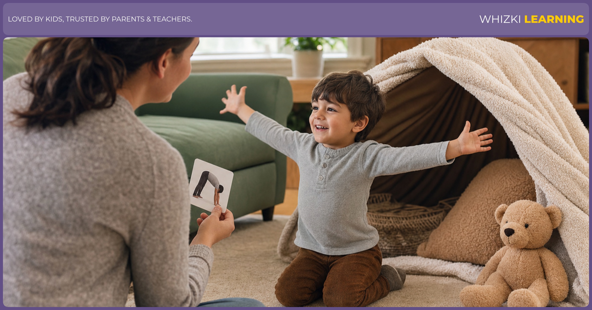 A parent and young child act out E verb cards together on a living room rug.