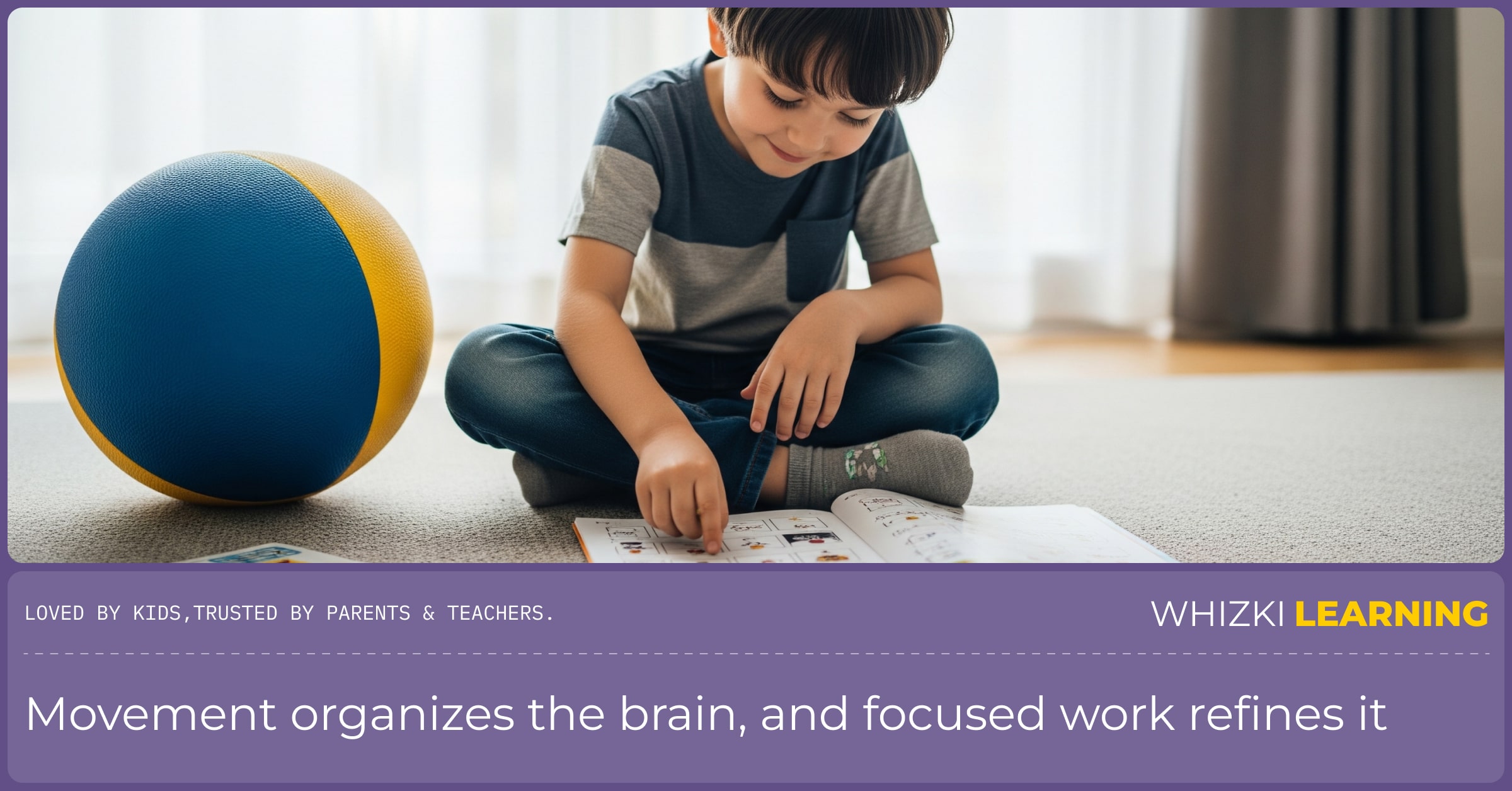 A calm child sits on a rug, happily focused on an open workbook. A colorful ball is visible in the background.