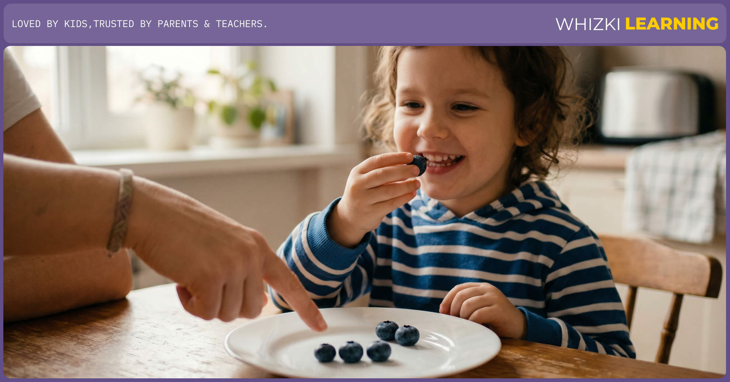 A parent and child sitting at a kitchen island, using fresh berries on a white plate to practice simple math problems.