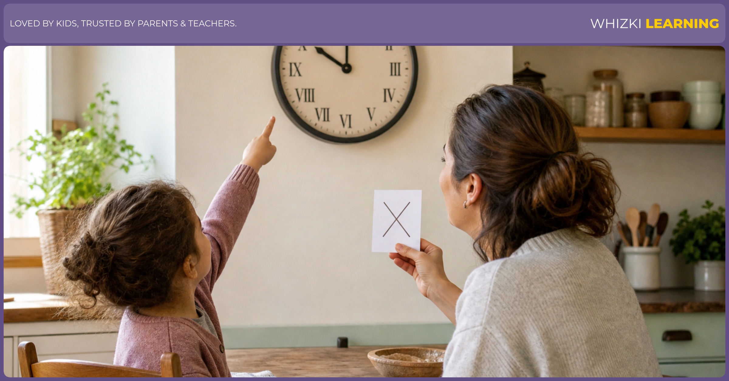 A parent and child sit at a kitchen table, the child points to 10 o'clock on a wall clock while the parent holds a paper with a simple X shape nearby