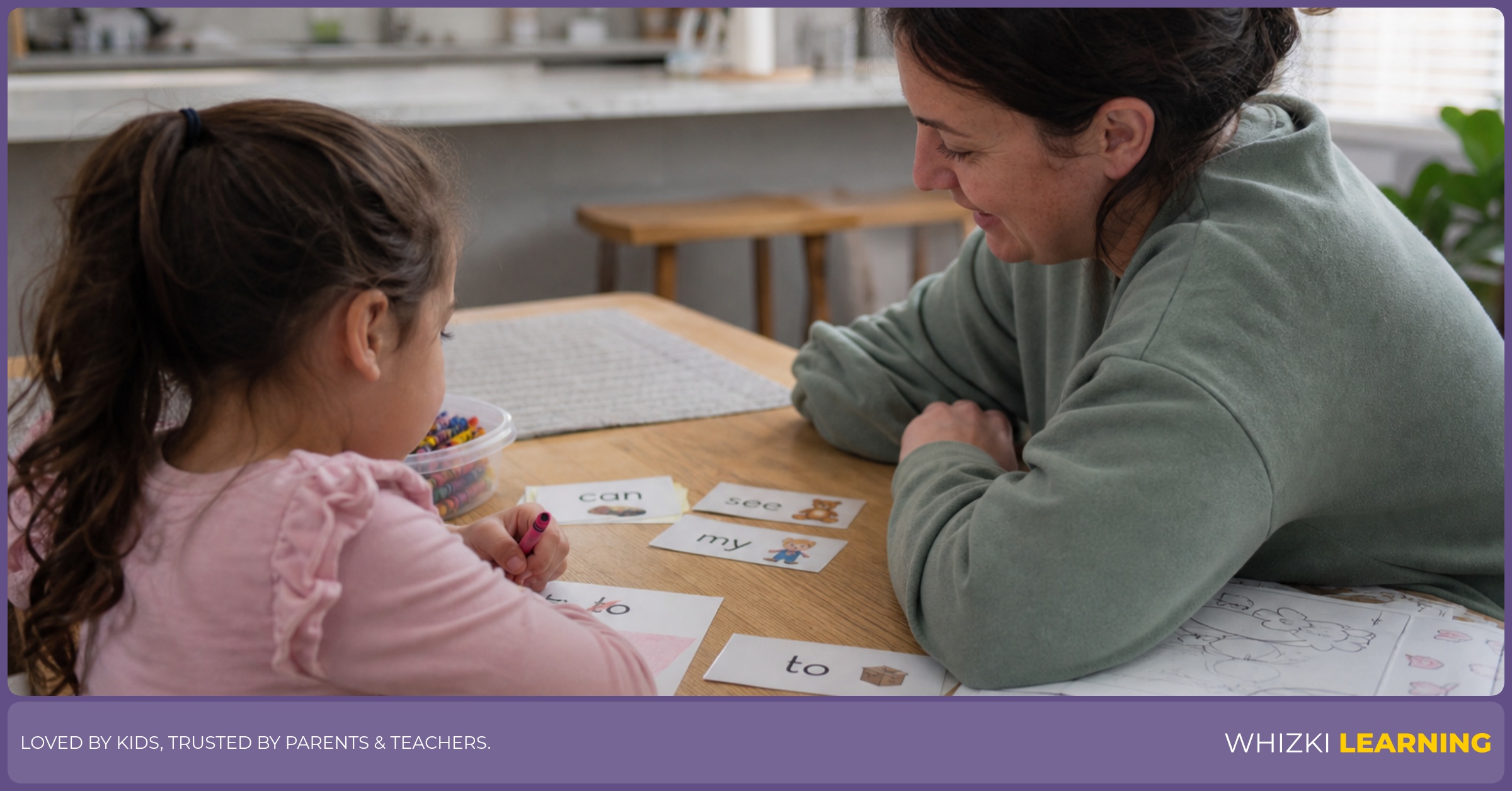 A parent and young child practice Dolch sight words with paper cards at a kitchen table.