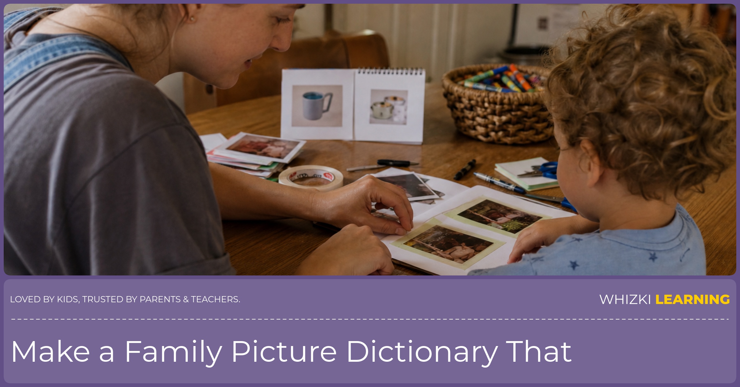 A parent and child make a small family picture dictionary with household photos at a kitchen table.