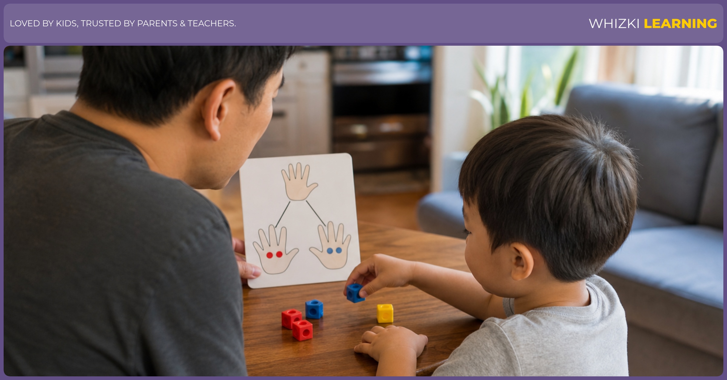 A parent and child split five blocks between two hands while practicing a number bond at the kitchen table.