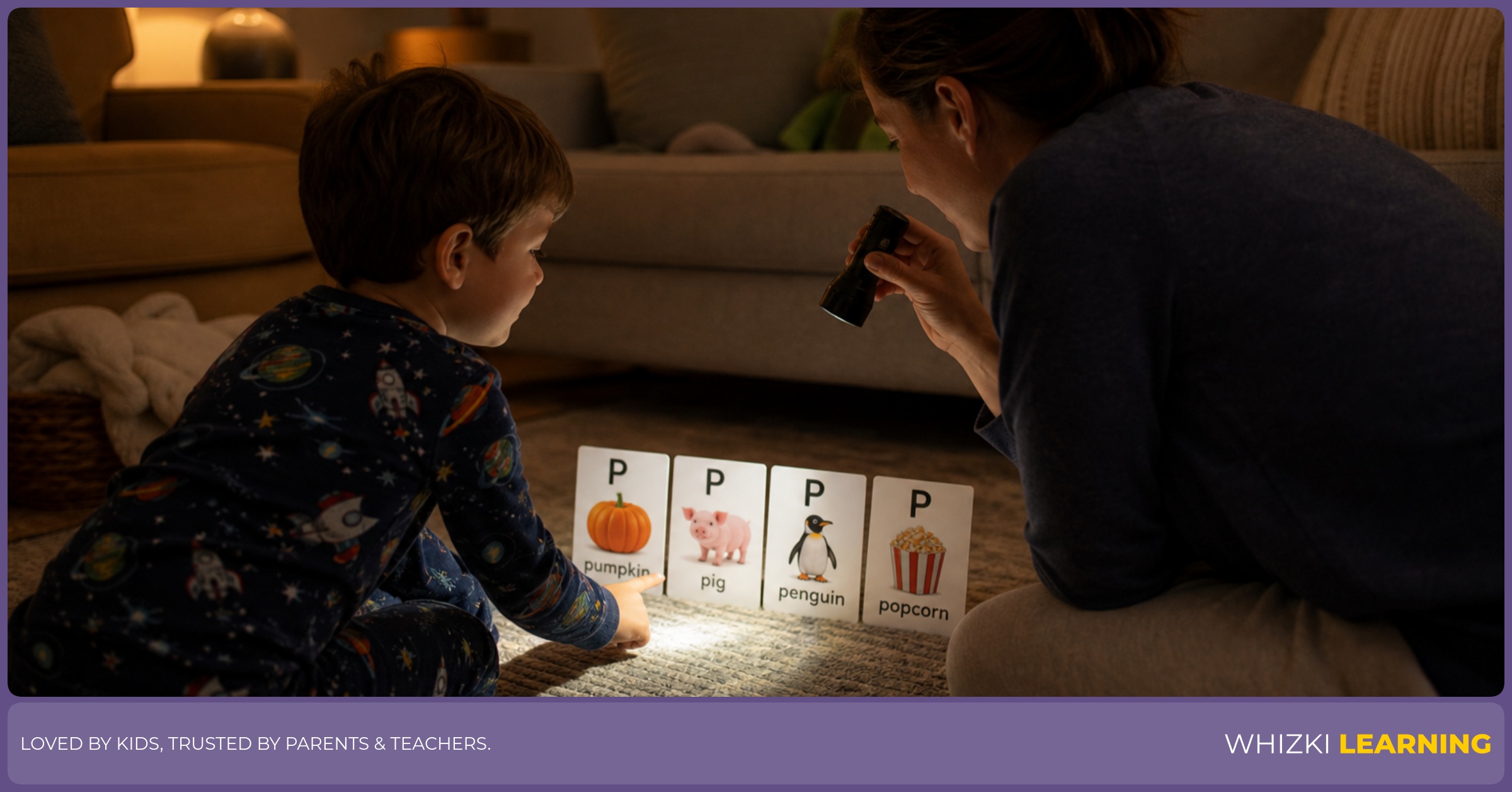 Bedtime flashlight game where a parent and child point to P words on paper cards in warm lamp light
