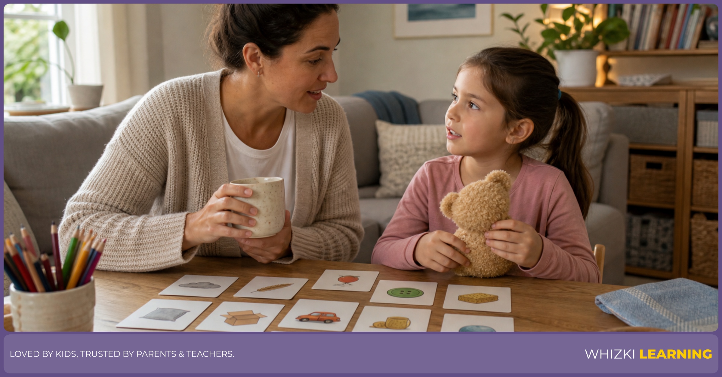 Parent and child using household items to sort J adjective cards by looks and size, pointing and matching cards to what they see