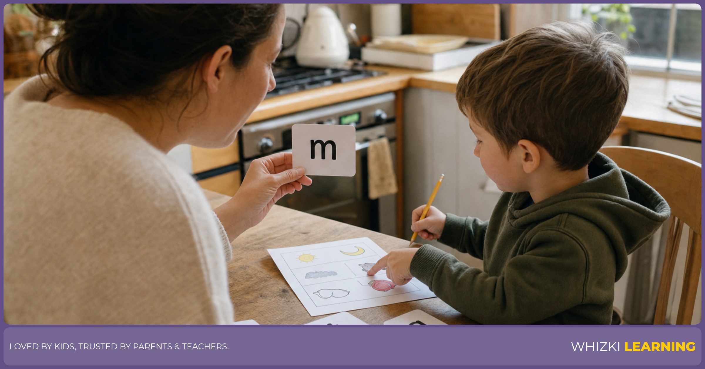 A parent and child sit at a kitchen table using paper letter cards for a short letter sound game.