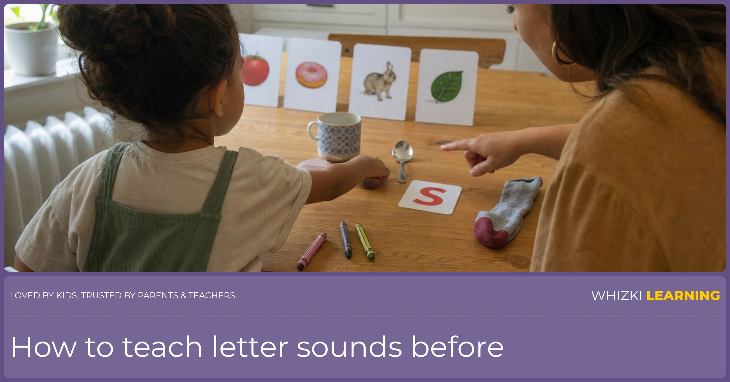 A parent and young child sort kitchen objects by beginning sound at a table.