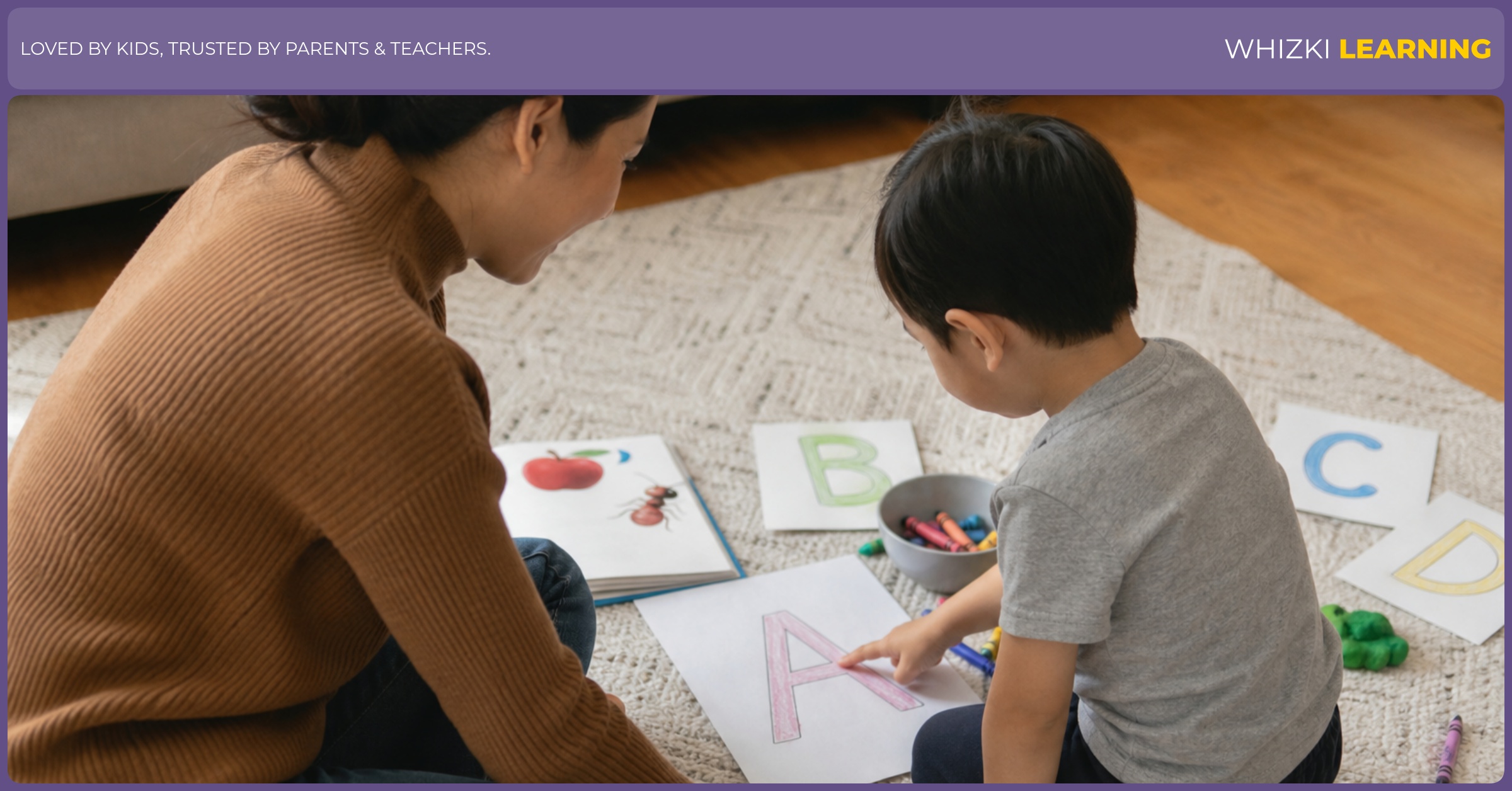 A caregiver and child practice alphabet sounds with paper printables, crayons, and a picture book on a living room rug.