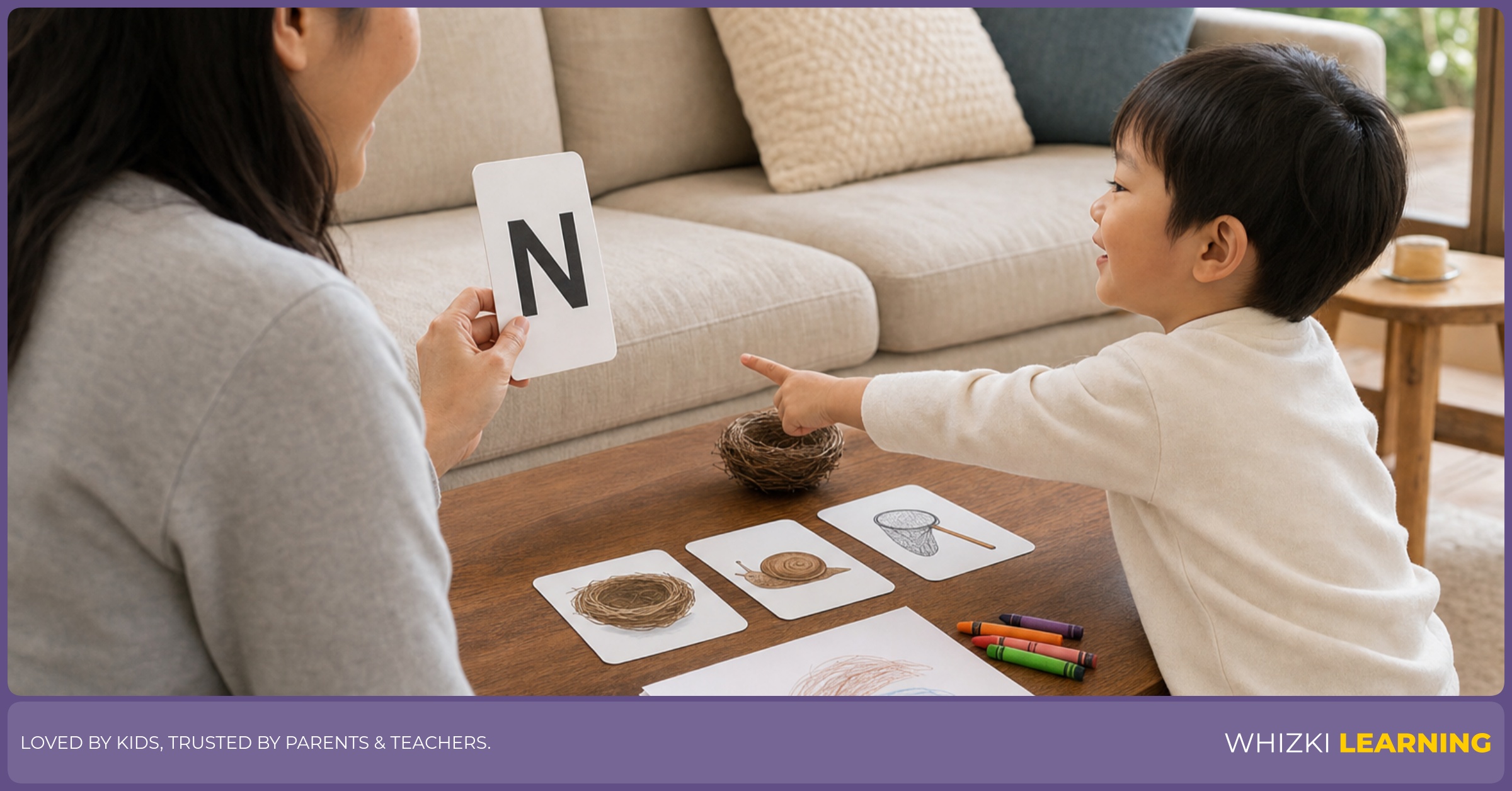 A parent and child play a short screen-free action game using simple props, the child practicing nodding and noticing while the parent models letter N action words. Warm natural light, gentle engagement, no distress.