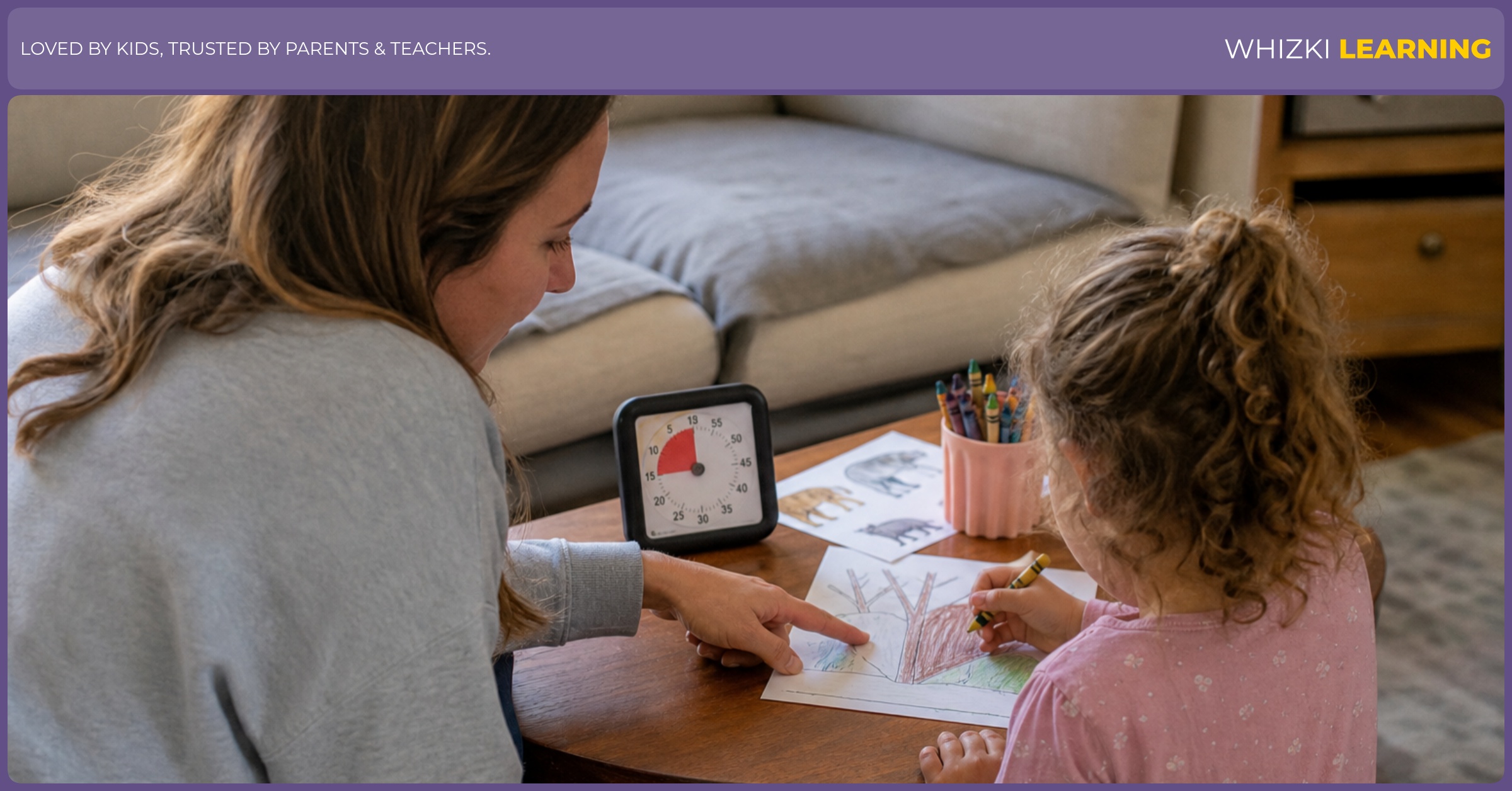 A caregiver uses a small timer while a child colors one paper activity with crayons in a quiet living room.