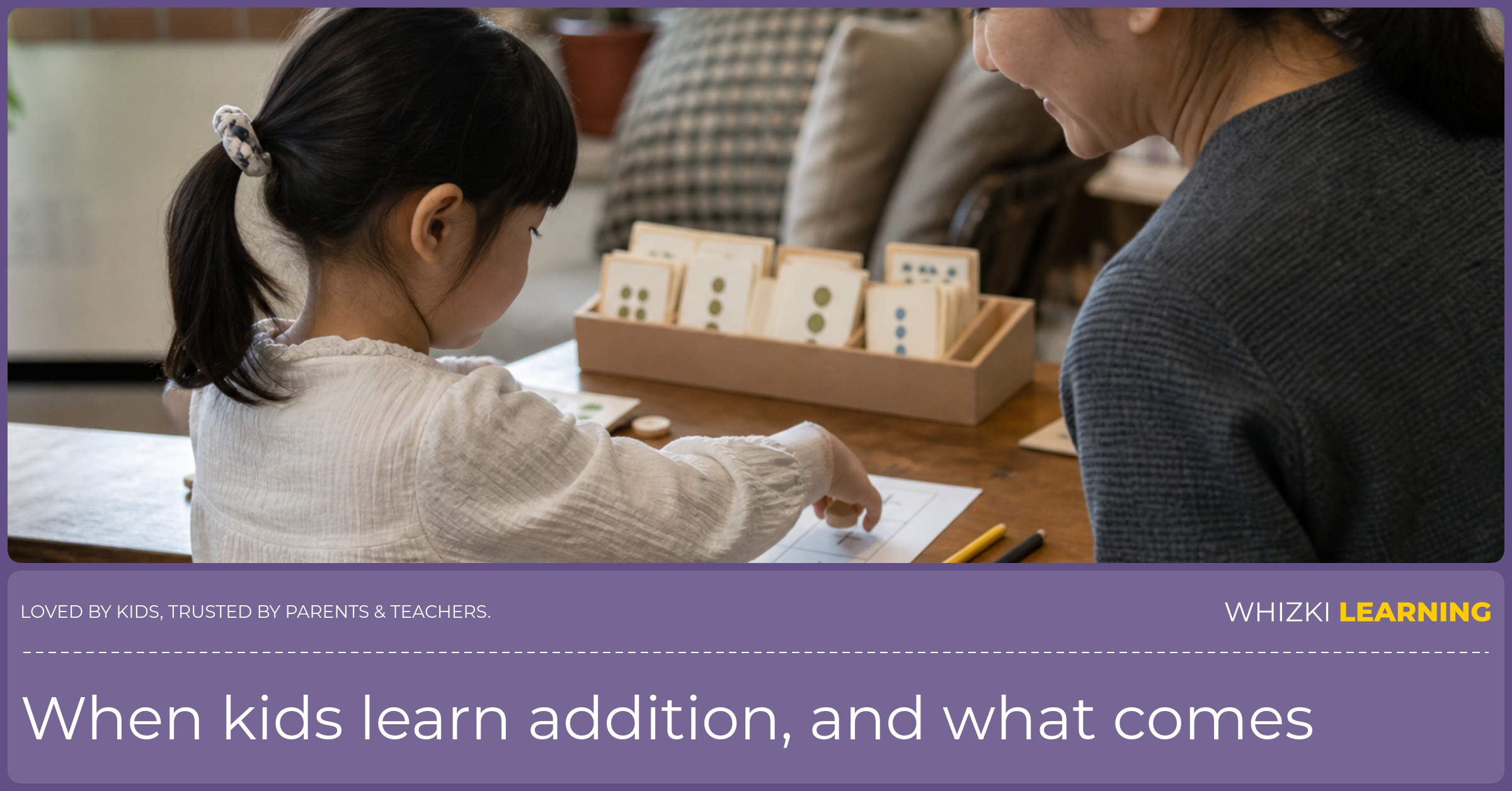 A caregiver sits beside a child who moves counters on a paper addition mat.