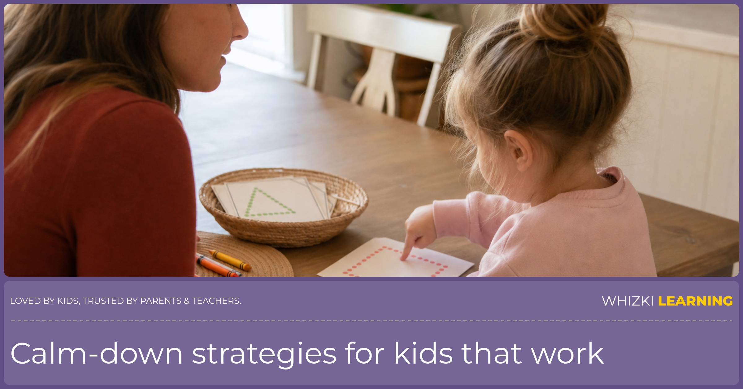 A parent sits beside a young child at a kitchen table while the child traces a breathing card with one finger.