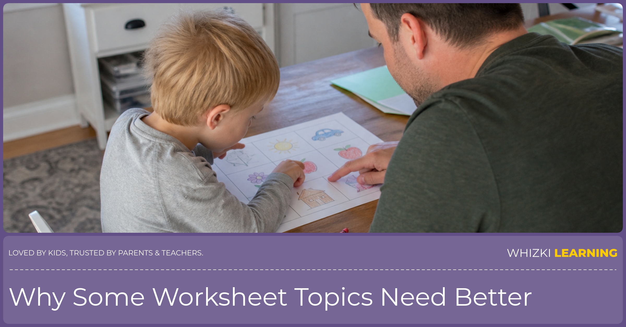 A parent and child sit at a kitchen table looking closely at picture-based worksheet images with crayons nearby.