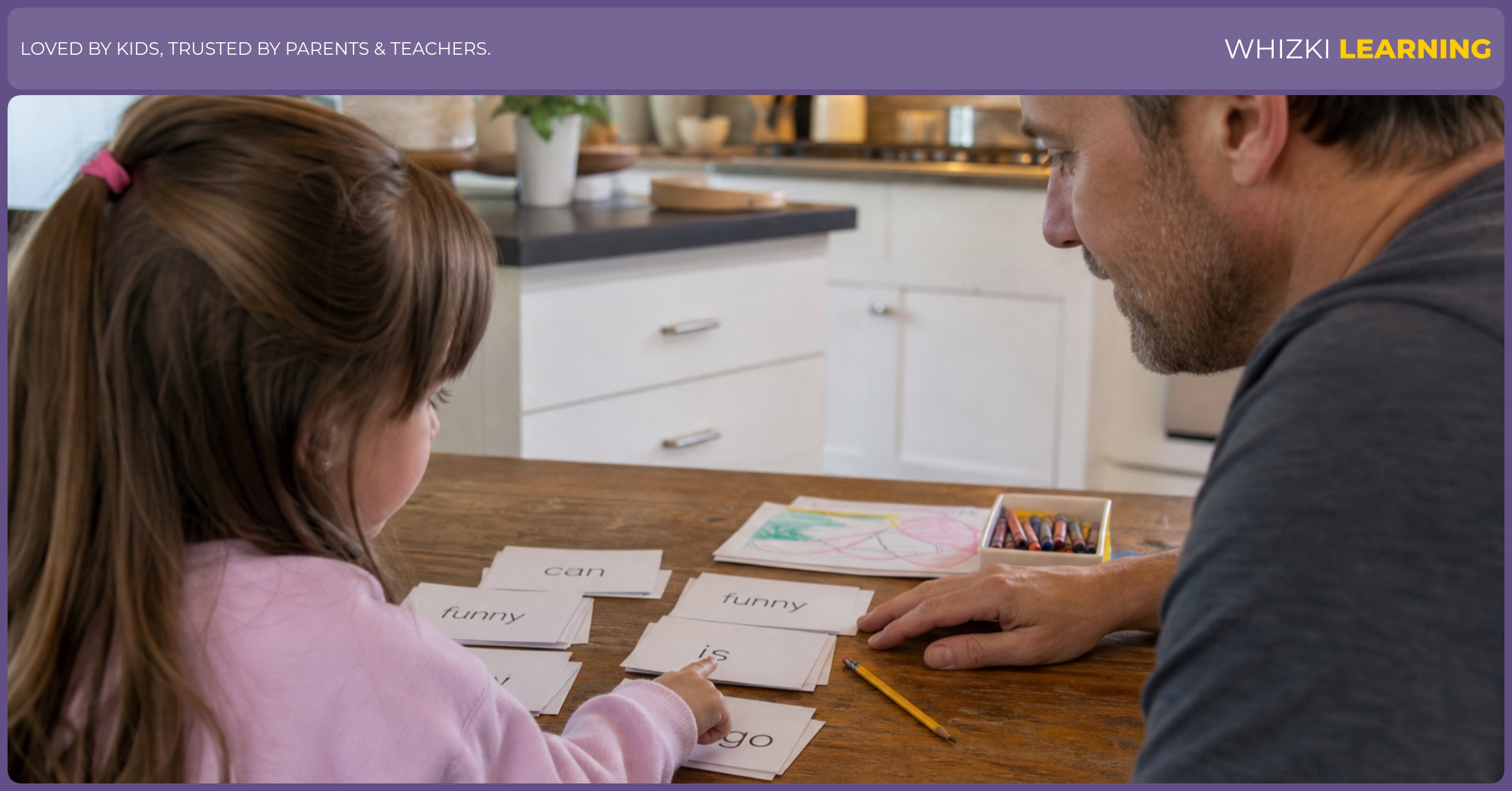 A parent sits beside a preschool child and practices paper sight-word cards at a kitchen table.