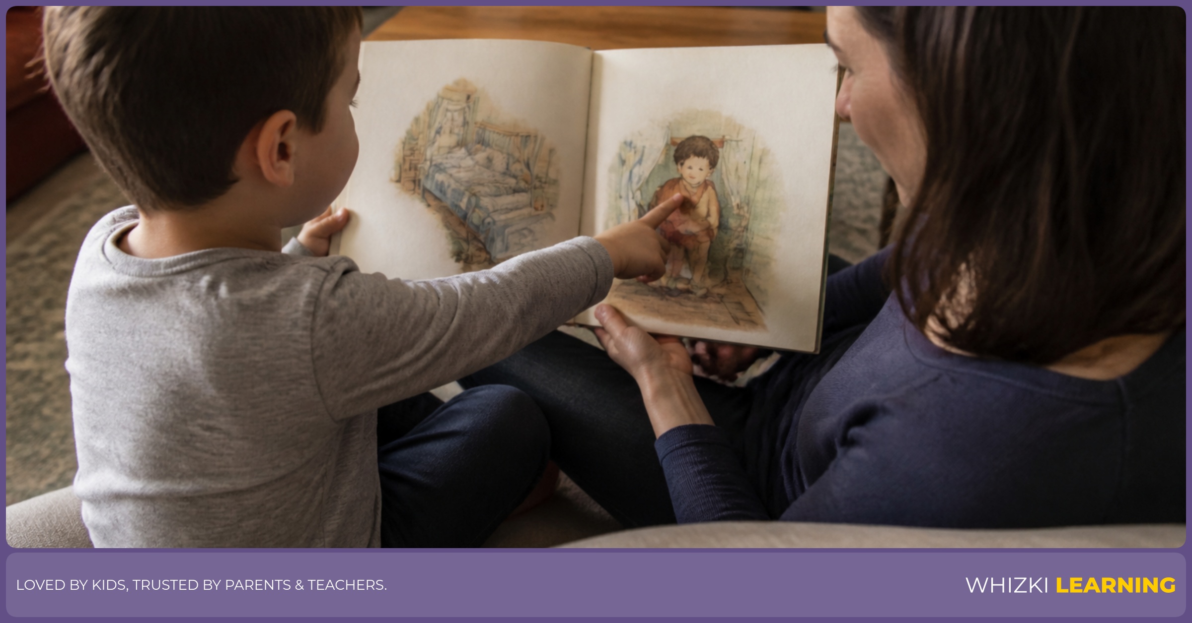 A parent and young child sit on a couch rereading a favorite picture book while the child points at the page.