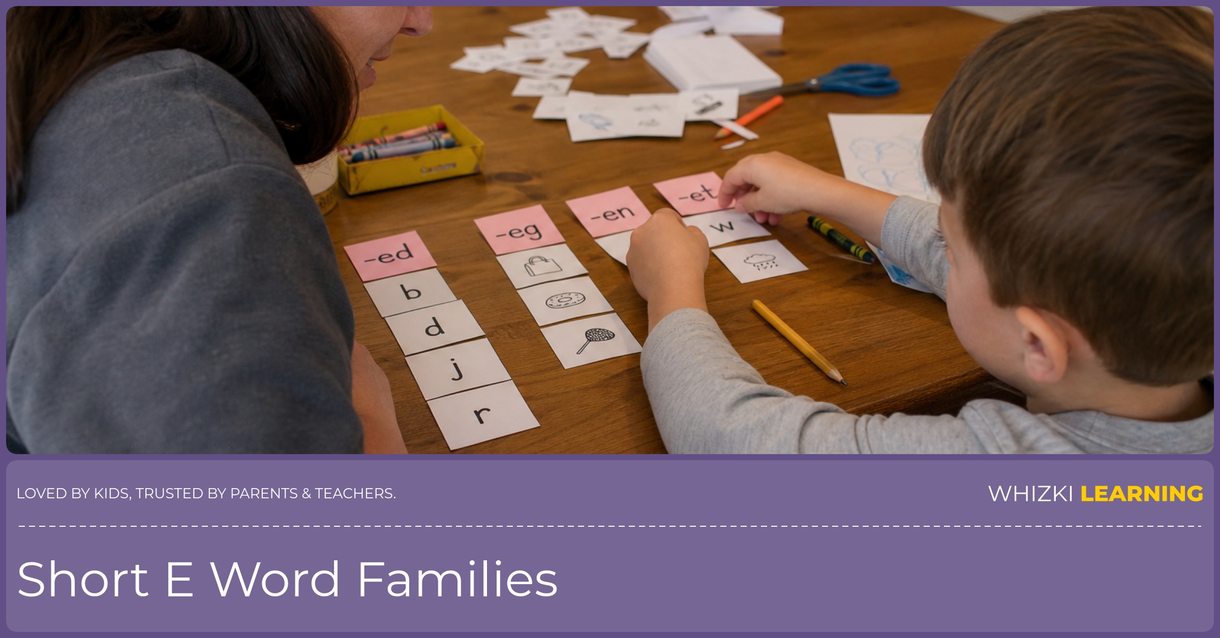 A parent and child sort short E word family cards together at a kitchen table.