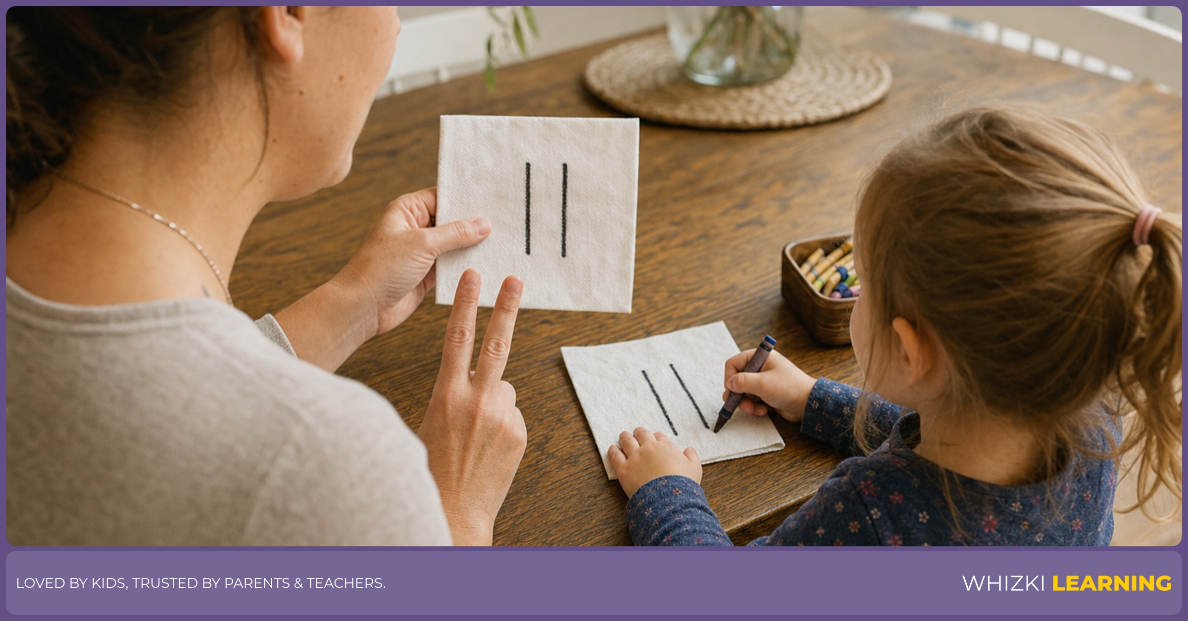 A parent and child trace Roman numeral II on a napkin together, using two-finger memory cues, in a calm home setting