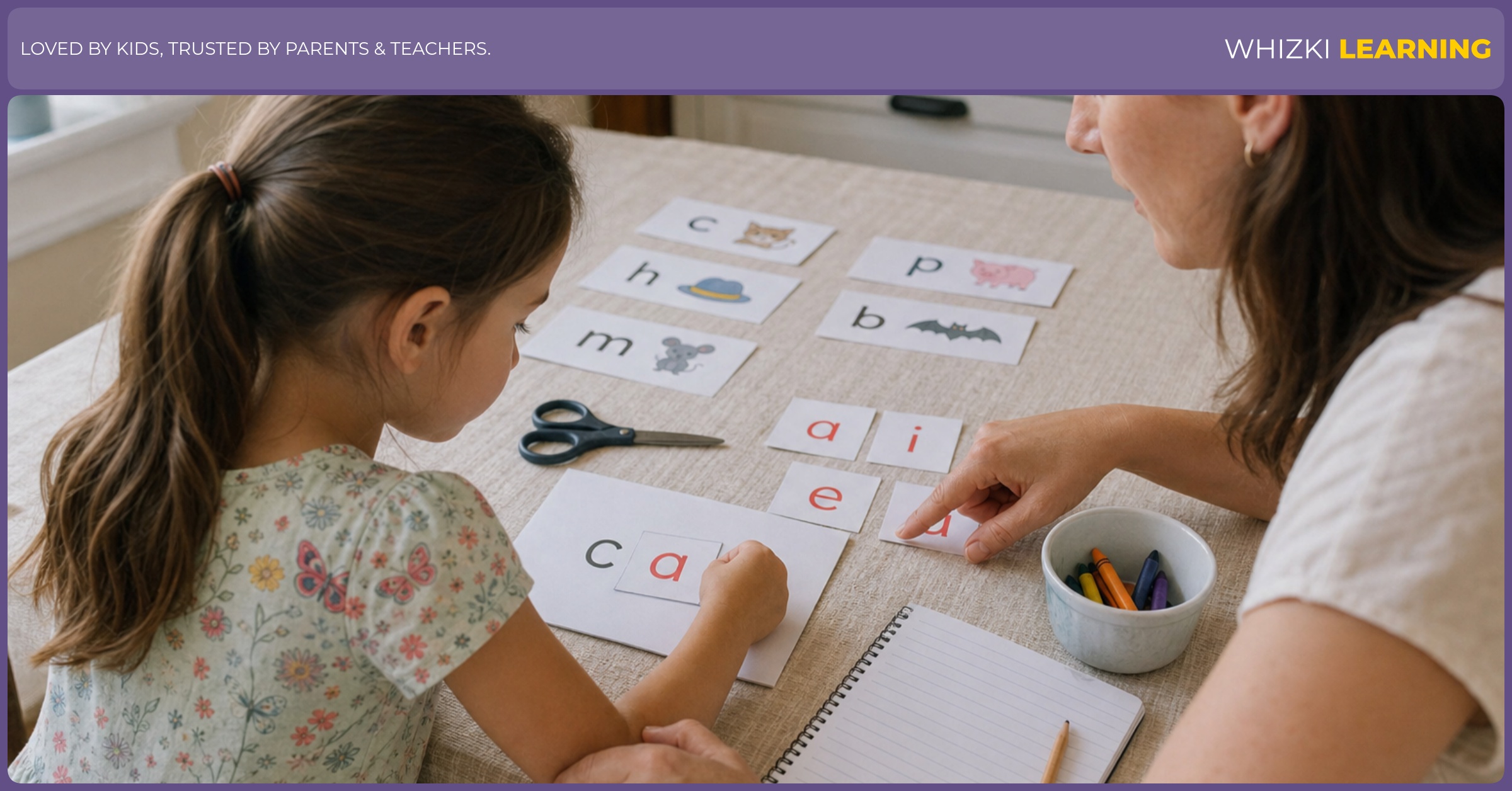 A caregiver helps a child swap vowel cards while reading short E and short A words.