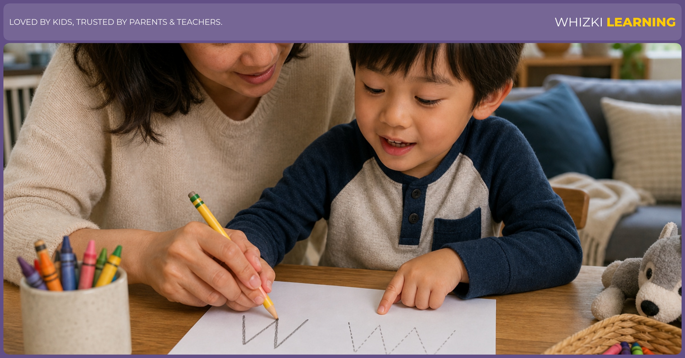 A parent helps a child practice the letter W while saying a matching W adjective