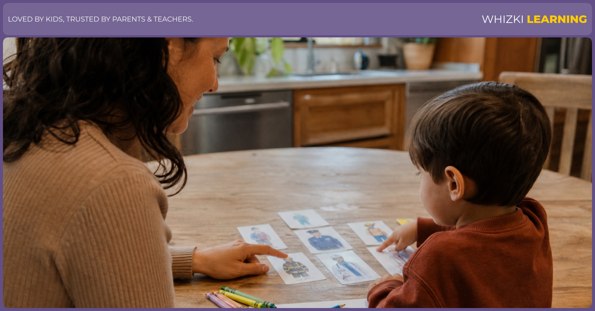 A parent and young child review community helper cards together at a kitchen table with crayons and sticky notes.